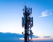 © Razif - Telecommunications tower against a blue sky at sunset