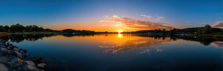 Poster - Panoramic View of Lake at Sunset With Reflections, Representing Tranquility and Environmental Conservation for Tourism Promotion : Generative AI