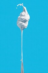 Aufkleber - White Creamy Liquid Swirls and Drips on Blue Background Studio Shot Abstract Minimalist Food Concept Ingredient Dessert