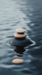 Poster - Stacked stones in water tranquility zen balance close up shot nature relaxation meditation spa wellness concept