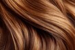 © ProStockPhoto - Close up view showcases flowing, voluminous tresses with a rich auburn hue and soft, gentle waves