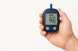 Close-up of hand holding a blood glucose meter displaying low blood sugar alert. concept of health monitoring, diabetic care, medical alert, insulin dependence, lifestyle management, white background