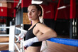 © New Africa - Woman with protective gloves on boxing ring