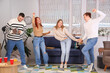 © Pixel-Shot - Group of young friends with radio receiver dancing at home party