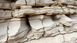 © Nicole - Nature force compressed prominent cracked rock layers structure formation details, in various shapes, colors, thicknesses, at south central coast of Crete, Greece. Nature Geological science concept.