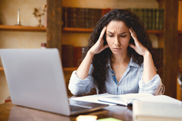 Aufkleber - Fatigue From Work. Tired young woman feeling headache or stress, touching and massaging her temples, working on laptop, trying to learn and study, sitting at desk with notebook and computer