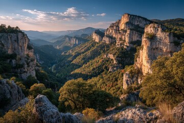 Aufkleber - Breathtaking view of rugged mountains during golden hour in a serene valley with trees and distant peaks