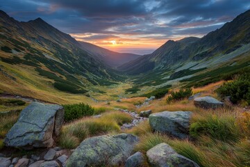 Poster - Scenic mountain valley at sunset showcasing vibrant colors and lush greenery