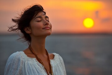 Aufkleber - Woman enjoys sunset by the sea with serene expression and gentle breeze on a warm evening