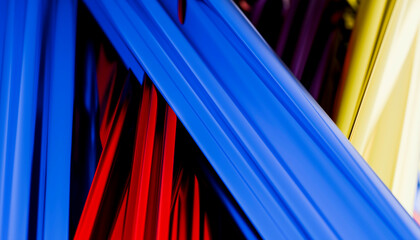 Vibrant abstract pattern with intersecting blue, red, and yellow shapes. Illustration, Blender 3D rendering