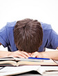 © Sabphoto - Tired Student sleeping