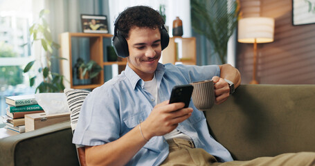 Aufkleber - Headphones, man and smile with phone on sofa for streaming service, watching online video and coffee break. Relax, person and smartphone in home for audio playlist, music album or internet connection