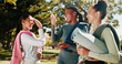 © peopleimages.com - Friends, yoga and women high five in park for workout, exercise and practice for mobility in morning. Nature, pilates class and people with gesture celebrate for wellness, health and wellbeing