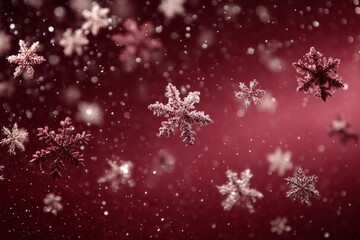Aufkleber - Snowflakes gently falling against a rich red background during winter celebrations at dusk in December