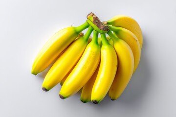 Wall Mural - Bunch of ripe yellow bananas on a light background showcasing their natural beauty and freshness