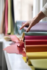 Vibrant collection of colorful textiles and fabrics displayed for interior design