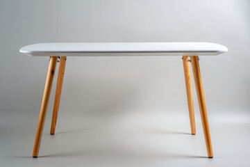Poster - Modern white table with wooden legs placed against a neutral background in a well-lit room