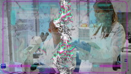 Poster - Lab researcher adjusting microscope as female peer offering sample pointing at glitch helix data
