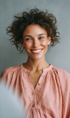 Poster - Soft Feminine Power Authentic Millennial Professional Portrait in Dusty Rose, Celebrating Natural Beauty and Empowered Workplace Diversity