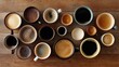 © Nurul - Various coffee cups filled with different types of coffee on a wooden table