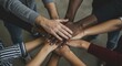© AlfaSmart - Unity and teamwork concept with diverse hands joined together