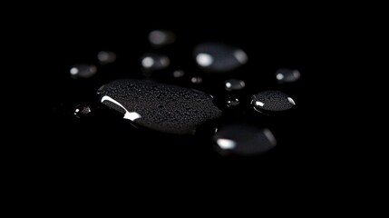 Aufkleber - Water droplets are captured in sharp detail mid-air, creating a stunning visual effect against a dark background that emphasizes their elegance and motion