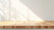 © Lasvu - Clean white kitchen background with empty wooden tabletop for product display