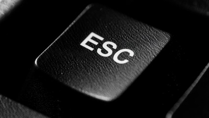 Poster - Keyboard with the word ESC in white letters on black keypad.