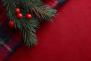 Wall Mural - Elegant red New Year's background with New Year's balls and Christmas tree branches