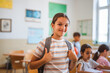 © Miljan Živković - focused school girl pupil sit in school class in the classroom