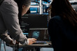 © DC Studio - Data center engineering team using AI visualization tool to optimize resource allocation. Server farm teamworking colleagues use artificial intelligence analysis software to do maintenance