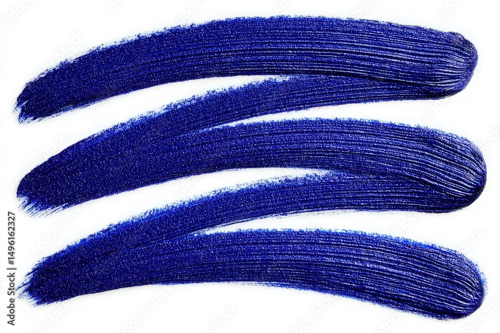 Rich blue paint is applied in three distinct strokes, showcasing texture and depth. The vibrant color can inspire artistic projects and creative designs, perfect for various applications.