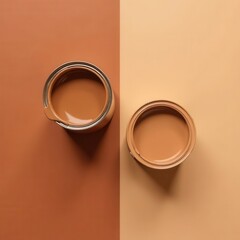 Poster - Two open paint jars rest on a divided canvas of rich brown and warm beige showcasing the subtle variations in color. This blend highlights the charm of neutral tones and creativity.