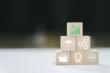 Poster - Stacked Wooden Blocks with Business and Education Symbols on a Neutral Background for Creative Concepts