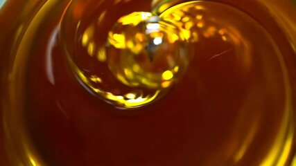 Poster - Abstract golden swirl of viscous liquid motion, rich texture and deep caramel hues, dynamic fluidity and organic movement in swirling patterns