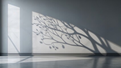 Poster - Shadow play of a tree on a minimalist wall in a bright, modern space during the day
