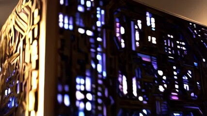 Poster - Abstract ornate cube with gold and blue geometric designs illuminated with artificial lighting creating a high-tech futuristic vibe.