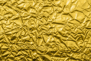 Wall Mural - luxury shiny metallic golden foil crumpled texture background