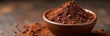 A rich, dark bowl of unsweetened cocoa powder, ready for use in baking or hot chocolate  The texture is smooth and deep brown, hinting at delicious chocolatey treats to come , texture, antioxidant