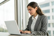 © MAqeel - business woman working on laptop