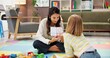 © peopleimages.com - Woman, therapist and child with visual lesson for private tutoring or assessment at therapy office. Female person, psychologist or academic practice with pictures for education or learning difficulty