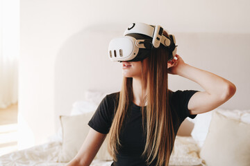 Poster - Young woman experiences immersive virtual reality in cozy indoor setting while wearing VR headset