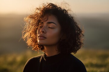 Leinwandbilder - Woman Meditating Outdoors at Sunset, Evoking Mindfulness and Mental Wellness in a Serene Setting, Perfect for Lifestyle and Self-Care Campaigns : Generative AI