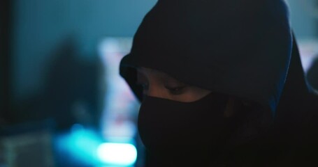 Poster - Night, hacker and person with mask, cybercrime and mysterious for ransomware in office, spy and thief. Anonymous, criminal and coder with hoodie for phishing, programmer and security breach for scam