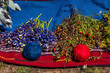 © Tetra Images - Colorful balls of naturally dyed alpaca yarn and native plants