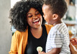© Lumos sp - child family mother portrait single woman happy son man boy black american african smiling happiness love together parent cute hug kid little