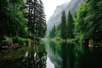 Aufkleber - Lush green landscape with serene waters and towering mountains at a quiet river in the early morning light