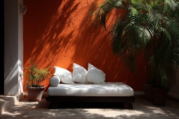 Poster - Sunny relaxation spot in a tropical setting with vibrant orange wall and lush plants