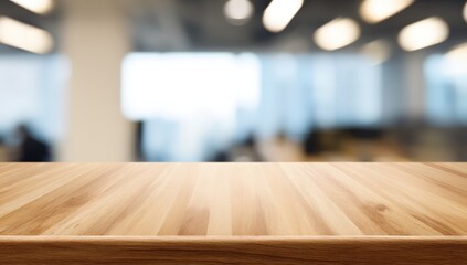 Poster - A wooden tabletop with a blurred modern office background, featuring bright lighting and large windows.
