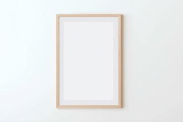 Poster - Minimalist wooden frame with a blank white poster on a clean, light wall.